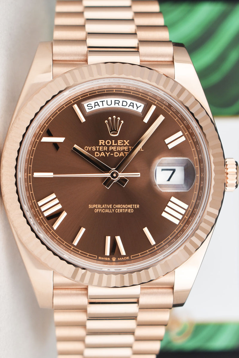 ROLEX 18kt Rose Gold Day Date 40 President Chocolate Roman Dial Model 228235
